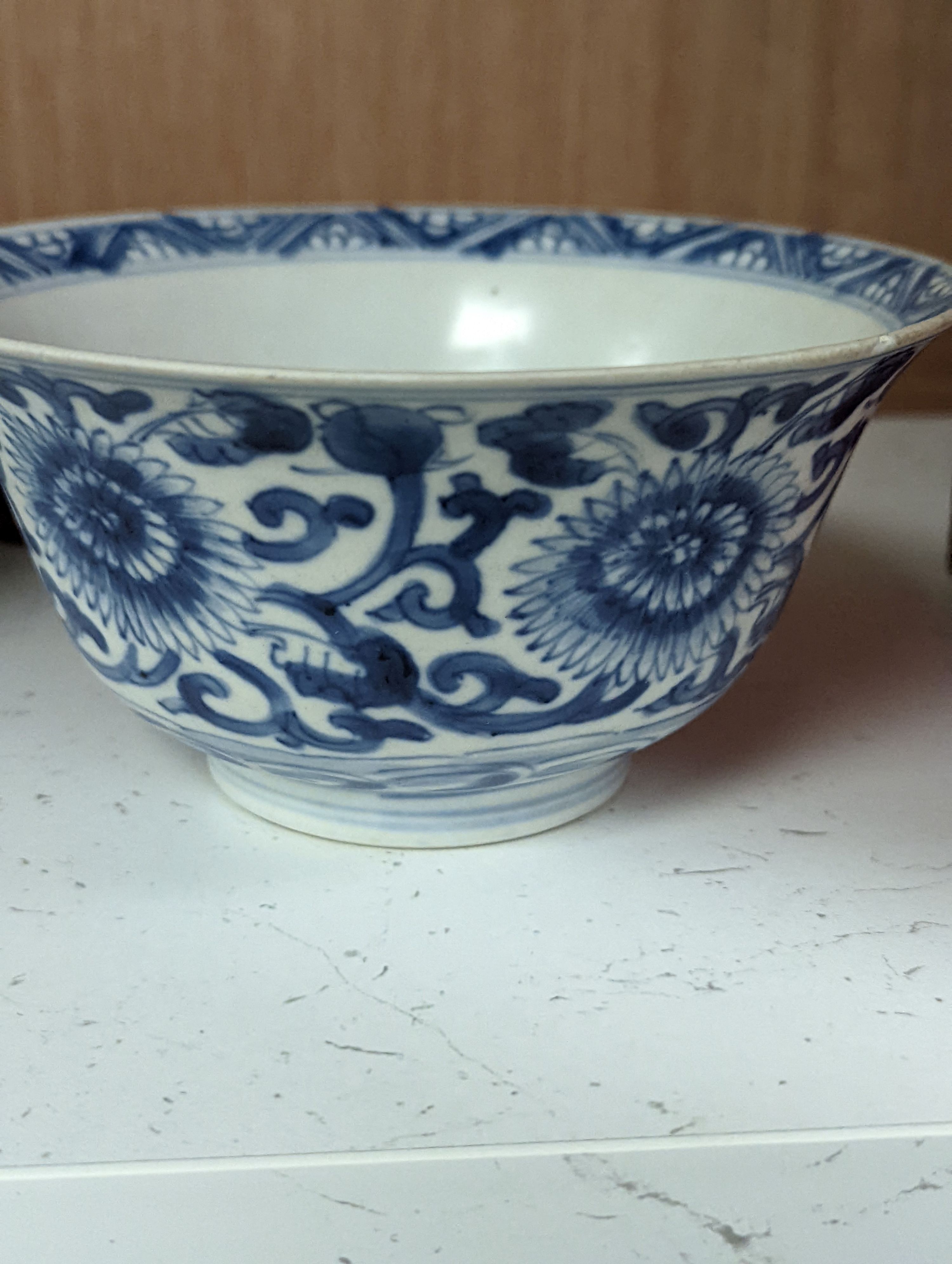 A Chinese blue and white bowl, Kangxi, 15cm. diam., a famille rose teapot stand, Yongzheng, and two doucai bowls